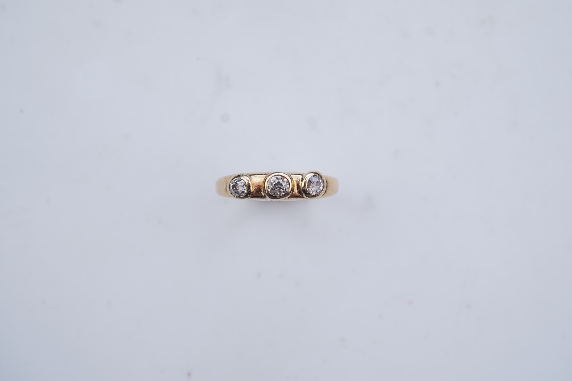 A three-stone diamond ring